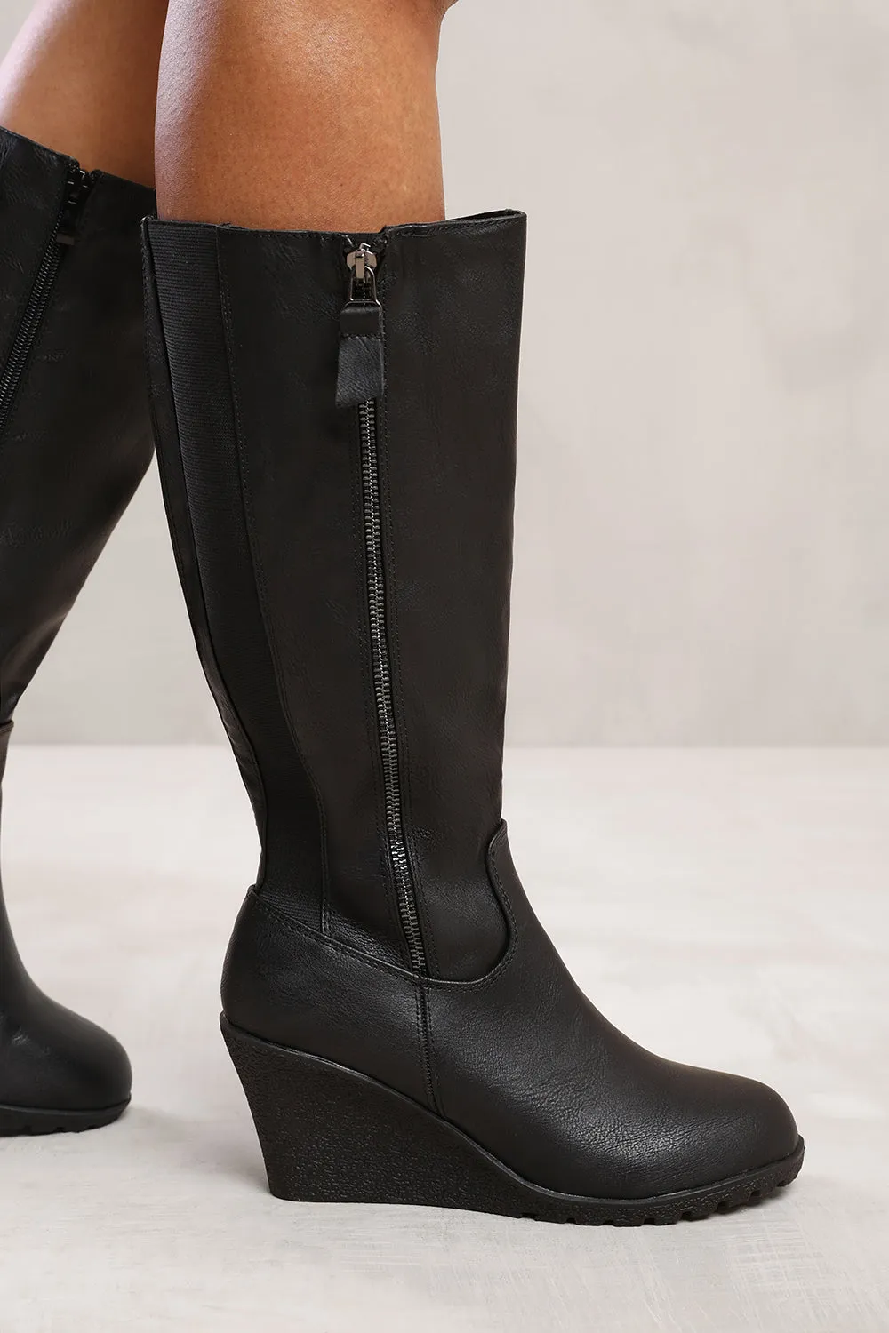 LEANE WEDGE HEEL MID CALF HIGH BOOTS WITH SIDE ZIP IN BLACK